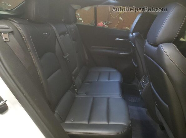 1GYFZFR44PF105666 2023 CADILLAC XT4 White Widok wnętrza z tyłu