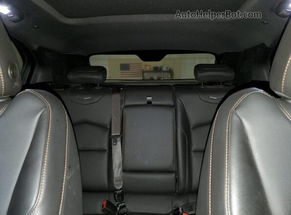 1GYFZFR47LF133990 2020 CADILLAC XT4 Silver Rear seats view