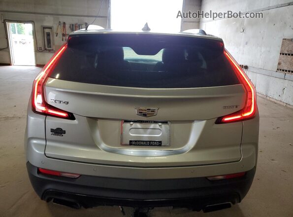 1GYFZFR47LF133990 2020 CADILLAC XT4 Silver Rear view