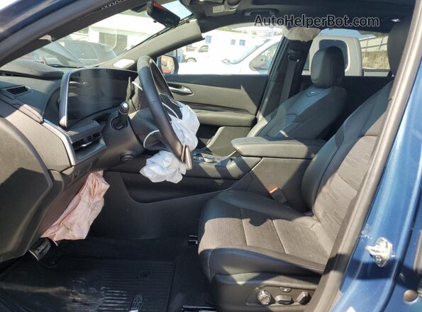 1GYFZFR48RF179949 2024 CADILLAC XT4 Blue Вид салону спереду