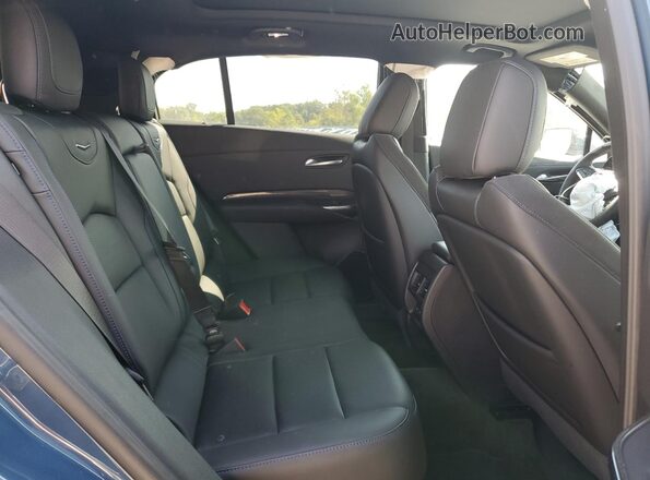 1GYFZFR48RF179949 2024 CADILLAC XT4 Blue Вид задньої частини салону