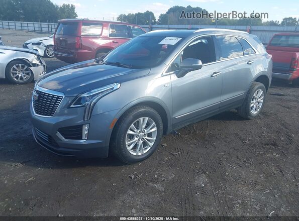 1GYKNAR45MZ140675 2021 CADILLAC XT5 Blue Front left