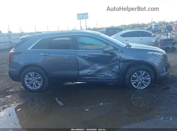1GYKNAR45MZ140675 2021 CADILLAC XT5 Blue Rear interior view