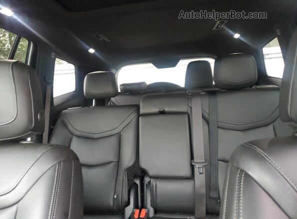 1GYKPBR49RZ706084 2024 CADILLAC OTHER Black Rear seats view