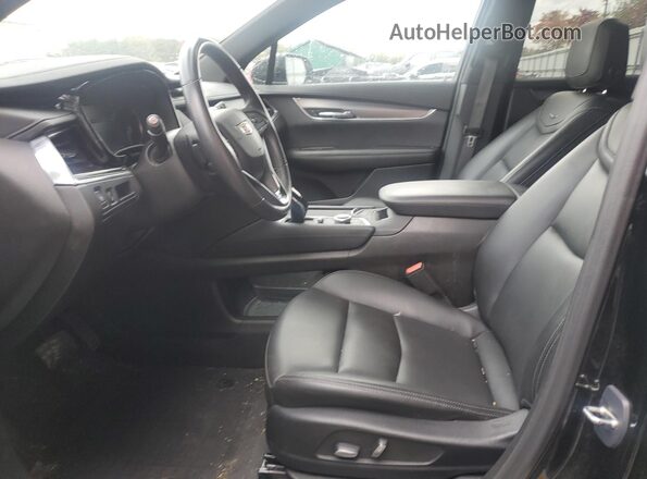 1GYKPBR49RZ706084 2024 CADILLAC OTHER Black Front interior view