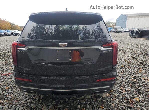1GYKPBR49RZ706084 2024 CADILLAC OTHER Black Rear view