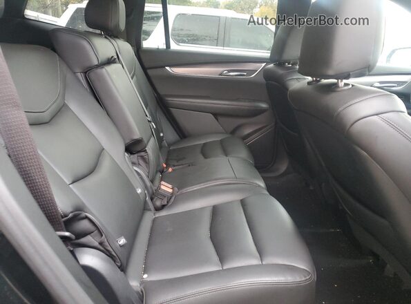 1GYKPBR49RZ706084 2024 CADILLAC OTHER Black Rear interior view