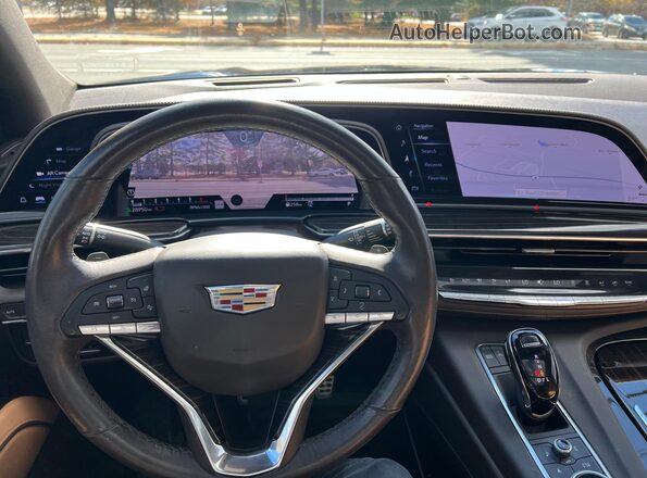 1GYS4FKL7PR104654 2023 CADILLAC ESCALADE Blue წინა სალონის ხედი