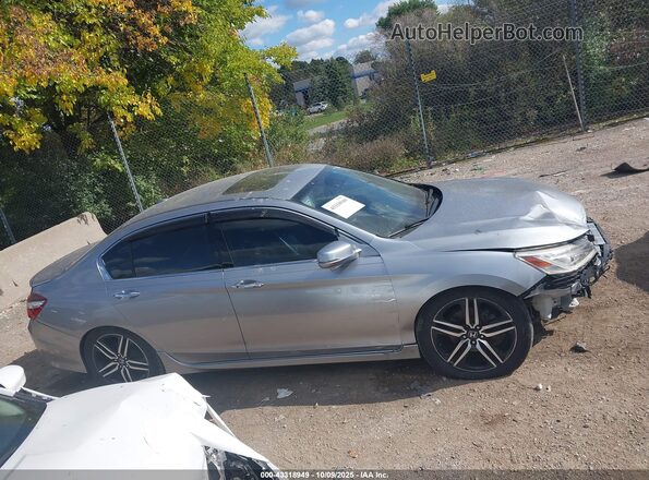 1HGCR3F95HA001047 2017 HONDA ACCORD Серебряный Вид задней части салона