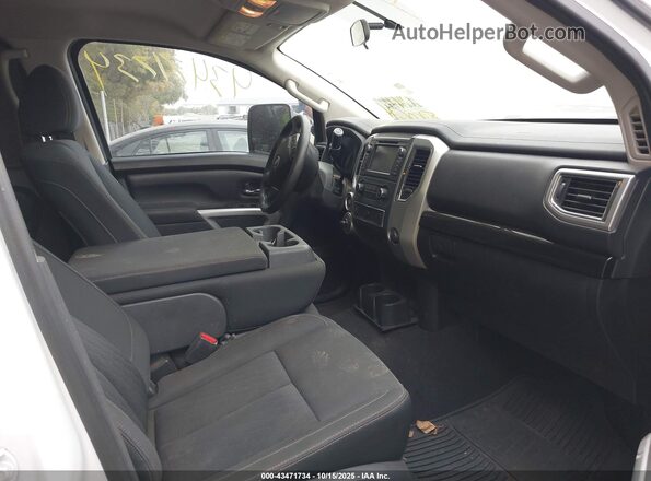 1N6BA1F37KN522169 2019 NISSAN TITAN XD White Front interior view