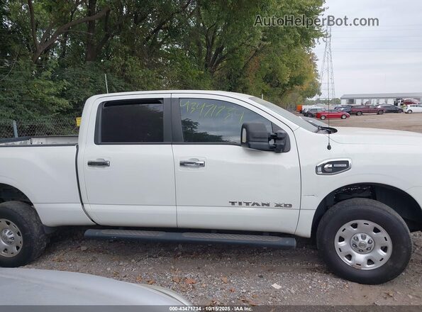 1N6BA1F37KN522169 2019 NISSAN TITAN XD White Rear interior view