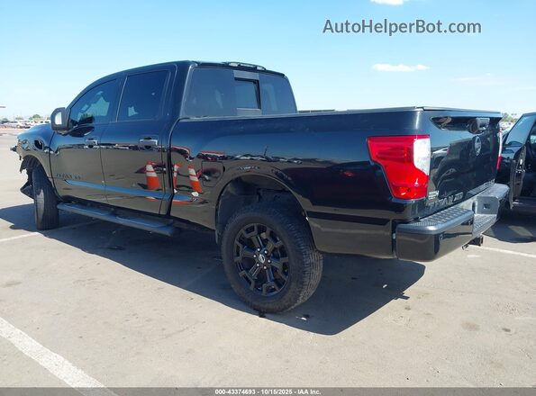 1N6BA1F41KN527697 2019 NISSAN TITAN XD Black Հետևի ձախ