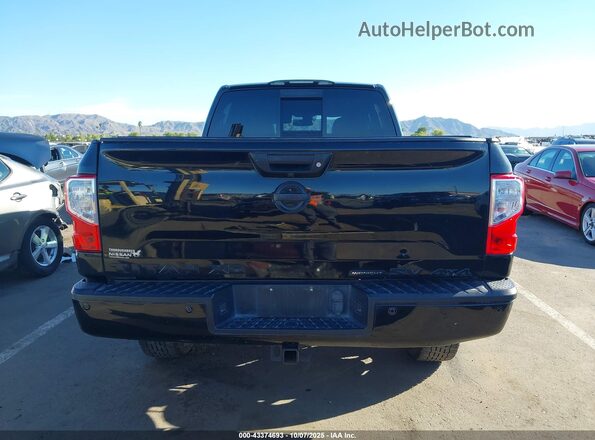 1N6BA1F41KN527697 2019 NISSAN TITAN XD Black 