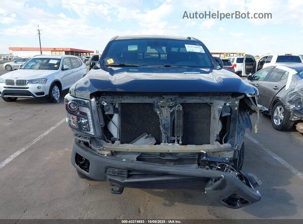 1N6BA1F41KN527697 2019 NISSAN TITAN XD Black Դիմացի տեսք