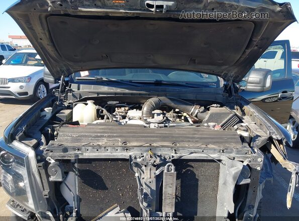 1N6BA1F41KN527697 2019 NISSAN TITAN XD Black Հետևի տեսք