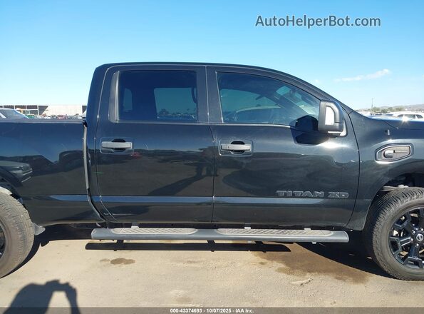 1N6BA1F41KN527697 2019 NISSAN TITAN XD Black Սալոնի հետևի տեսք
