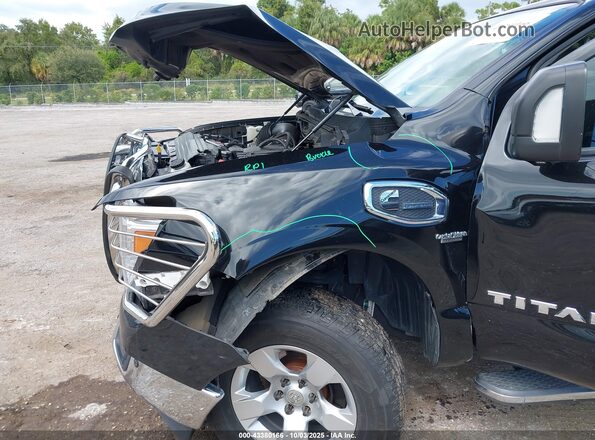 1N6BA1F46JN534482 2018 NISSAN TITAN XD Black Front view