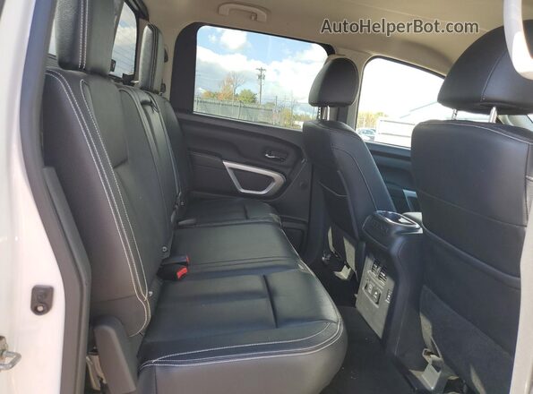 1N6BA1F49KN511134 2019 NISSAN TITAN White Вид задніх сидінь