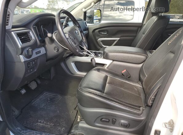 1N6BA1F49KN511134 2019 NISSAN TITAN White Вид салону спереду