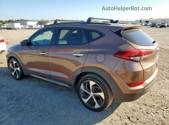 KM8J3CA27GU029538 2016 HYUNDAI TUCSON Brown 
