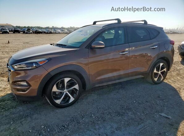 KM8J3CA27GU029538 2016 HYUNDAI TUCSON Brown 