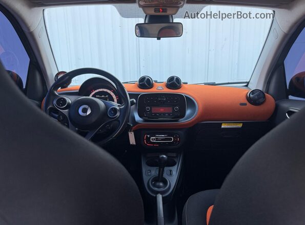 WMEFJ9BAXHK230583 2017 SMART FORTWO Orange Rear seats view