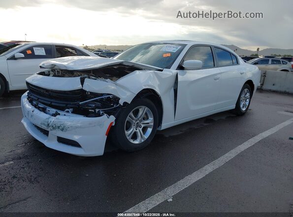 2C3CDXBG7NH208310 2022 DODGE CHARGER White Vista tres cuartos delantera izquierda