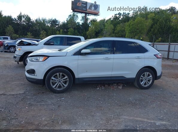 2FMPK3J97LBA57687 2020 FORD EDGE White 360 interior view
