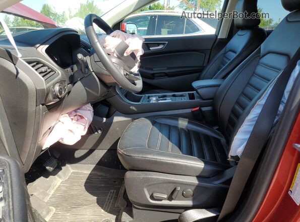 2FMPK4J90RBA19720 2024 FORD EDGE Burgundy Widok wnętrza z przodu