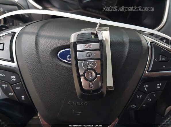 2FMPK4J93LBA68045 2020 FORD EDGE Серебряный Вид панели приборов