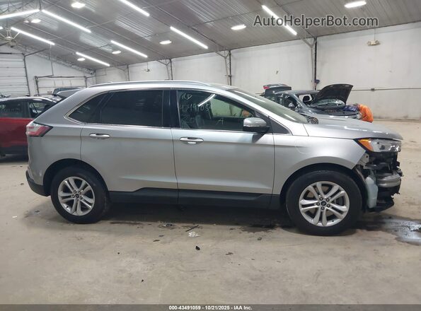 2FMPK4J93LBA68045 2020 FORD EDGE Серебряный Вид задней части салона
