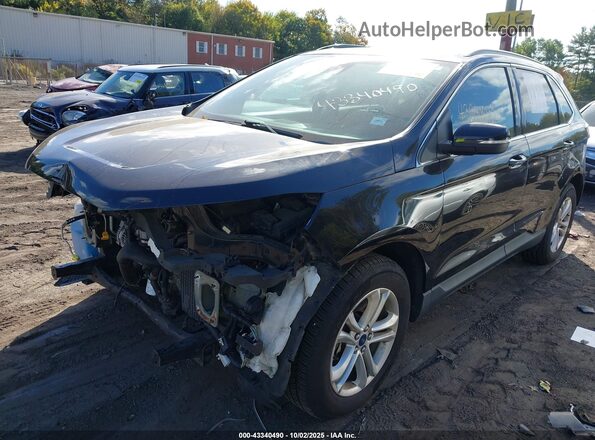 2FMPK4J95LBB63657 2020 FORD EDGE Black Vista tres cuartos delantera izquierda