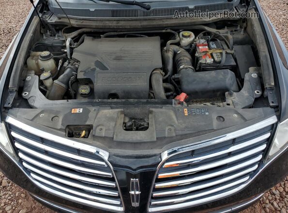 2LMHJ5AT7KBL00660 2019 LINCOLN MKT Black Widok komory silnika