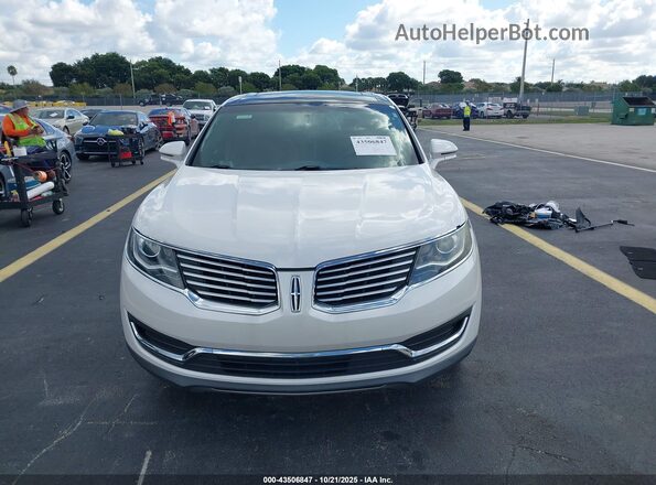2LMPJ6LR0JBL26437 2018 LINCOLN MKX White Vista del cuadro de instrumentos