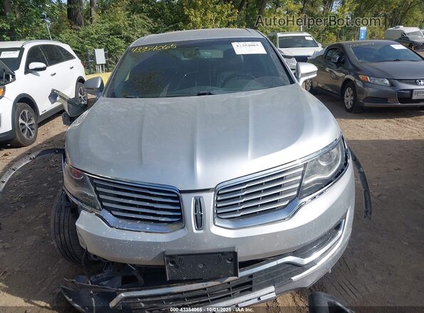 2LMPJ8KRXHBL24282 2017 LINCOLN MKX Silver Rear interior view