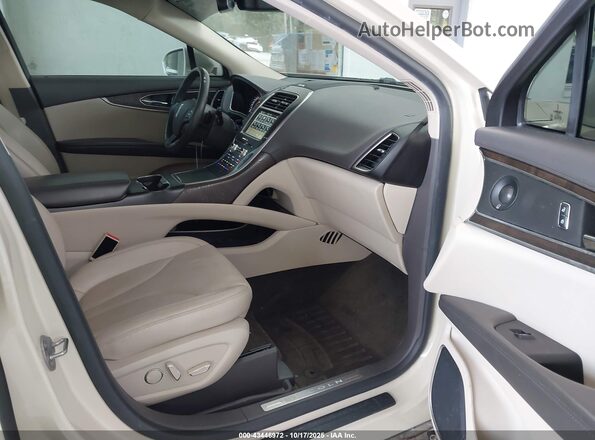 2LMTJ8LP8GBL52043 2016 LINCOLN MKX White Widok wnętrza z przodu