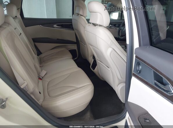 2LMTJ8LP8GBL52043 2016 LINCOLN MKX White Widok naklejki z numerem VIN