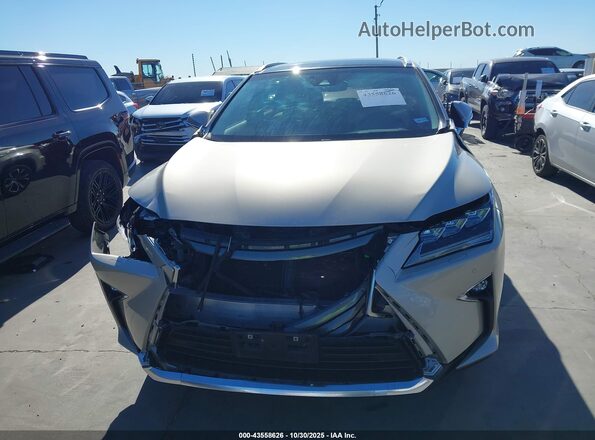 2T2BGMCA3JC024750 2018 LEXUS RX 450H Коричневый Вид щитка приборов