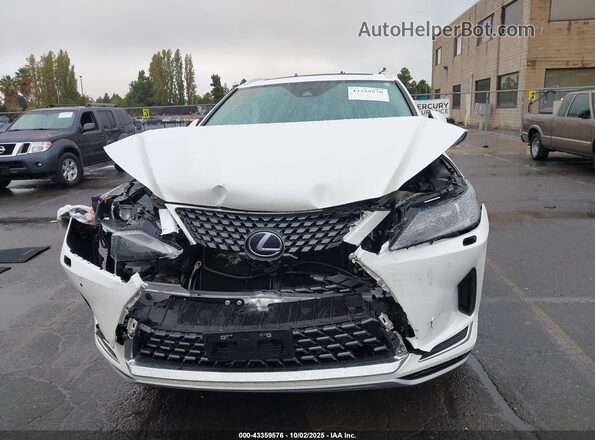 2T2HGMDA7NC077658 2022 LEXUS RX 450H Белый Вид панели приборов