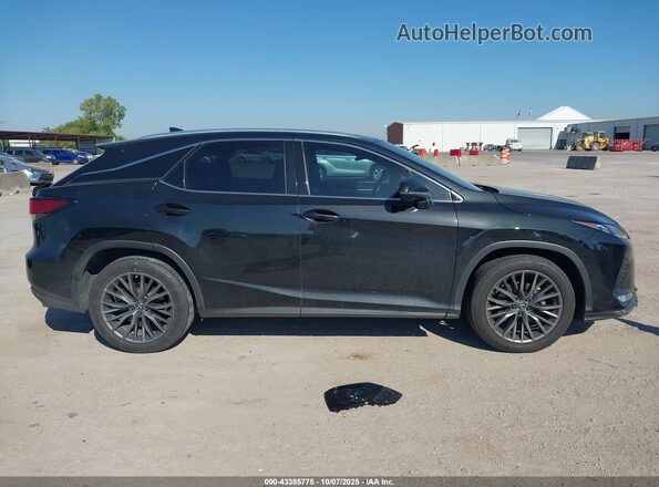 2T2YZMDA0LC244384 2020 LEXUS RX 350 Коричневый Вид задней части салона