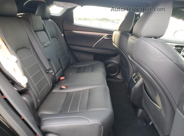 2T2YZMDA0LC251450 2020 LEXUS RX Black Vista interior trasera