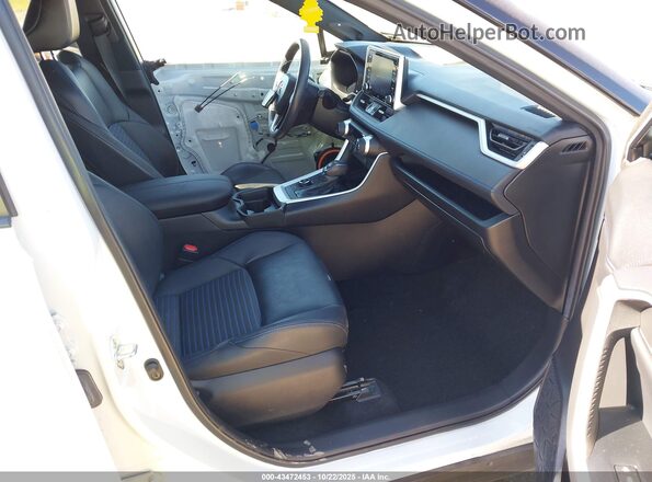 2T3E6RFV0MW021587 2021 TOYOTA RAV4 HYBRID White Front interior view