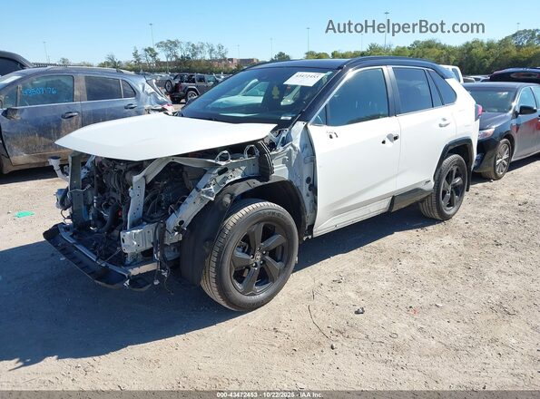 2T3E6RFV0MW021587 2021 TOYOTA RAV4 HYBRID White Front left