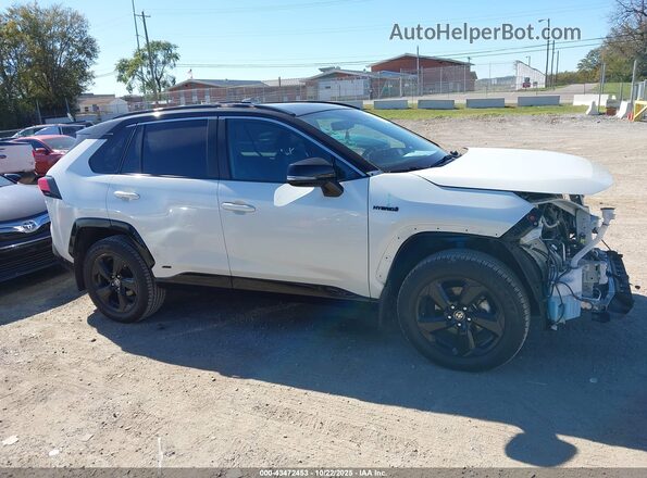 2T3E6RFV0MW021587 2021 TOYOTA RAV4 HYBRID White 360 interior view