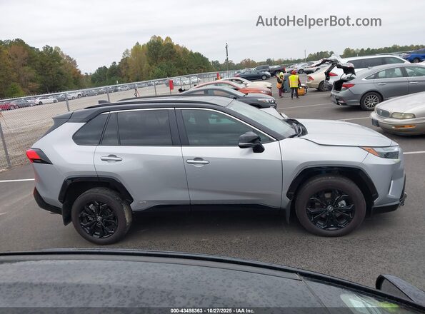 2T3E6RFV6RW063723 2024 TOYOTA RAV4 HYBRID Silver Rear interior view