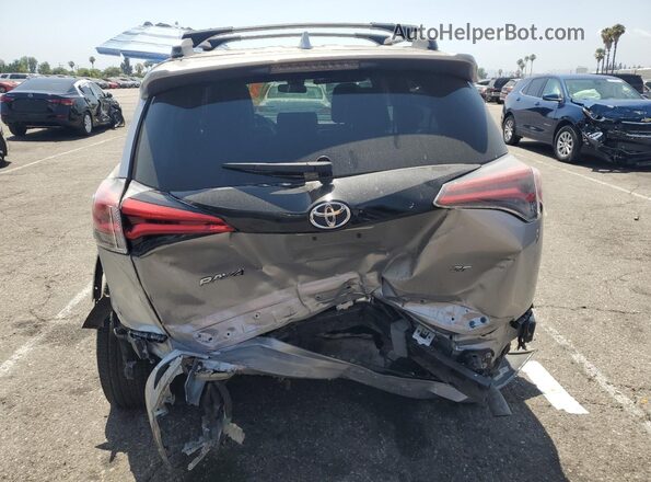2T3NFREV7GW286366 2016 TOYOTA RAV4 Silver Հետևի տեսք