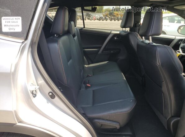 2T3NFREV7GW286366 2016 TOYOTA RAV4 Silver Սալոնի հետևի տեսք