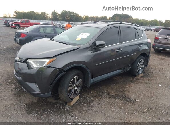 2T3RFREV9HW635885 2017 TOYOTA LE Gray Vista tres cuartos delantera izquierda