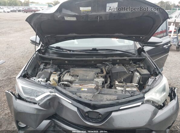 2T3RFREV9HW635885 2017 TOYOTA LE Gray Vista trasera