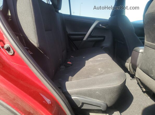 2T3WFREV9JW467559 2018 TOYOTA RAV4 Burgundy Vista de los asientos traseros